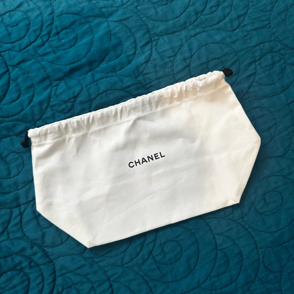 CHANEL Elegant White Fabric Pouch approximately 10”x6”